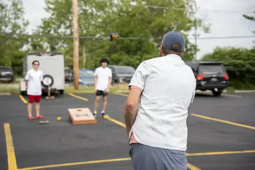 Patients Playing Corn Hole at Harbor Lights Dental Care Event
